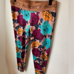 Nike Dri Fit Icon Rose Mid Rise Leggings